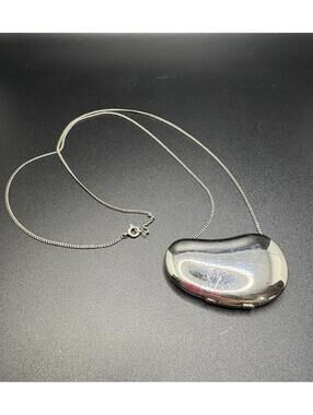 1970s Elsa Peretti X Halston Silver Solid Perfume Compact Bean Necklace
